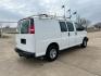 2012 White /Gray Chevrolet Express 2500 Cargo (1GCWGFCB4C1) with an 6.0L V8 OHV 16V FFV engine, 6-Speed Automatic transmission, located at 17760 Hwy 62, Morris, OK, 74445, (918) 733-4887, 35.609104, -95.877060 - 2012 CHEVROLET EXPRESS CARGO VAN 6.0L V8 RWD FEATURING MANUAL LOCKS, MANUAL WINDOWS, MANUAL MIRRORS, MANUAL SEATS, AM/FM STEREO, LEATHER SEATS, LEATHER-WRAPPED STEERING WHEEL, TRACTION CONTROL, LOCKING METAL CONSOLE, STEEL SHELVES, SPLIT SWING-OUT RIGHT DOORS, RUBBER MATS, LOAD-BEARING EXTERIOR RACK - Photo#4